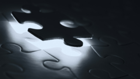 Glowing puzzle piece
